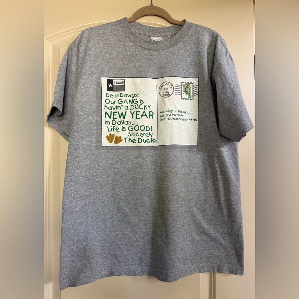 Gray L Graphic T-Shirt From Oregon Football Duck to the Washington Huskies Dog.